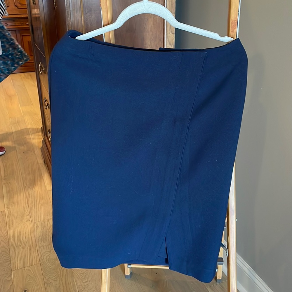 Great office skirt! Dark navy. Front zipper fashionably off center.